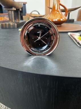 Seiko QHE037SLH Brushed Silver Tone Round Alarm Clock with Black Dial